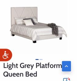 Queen upholstered bed