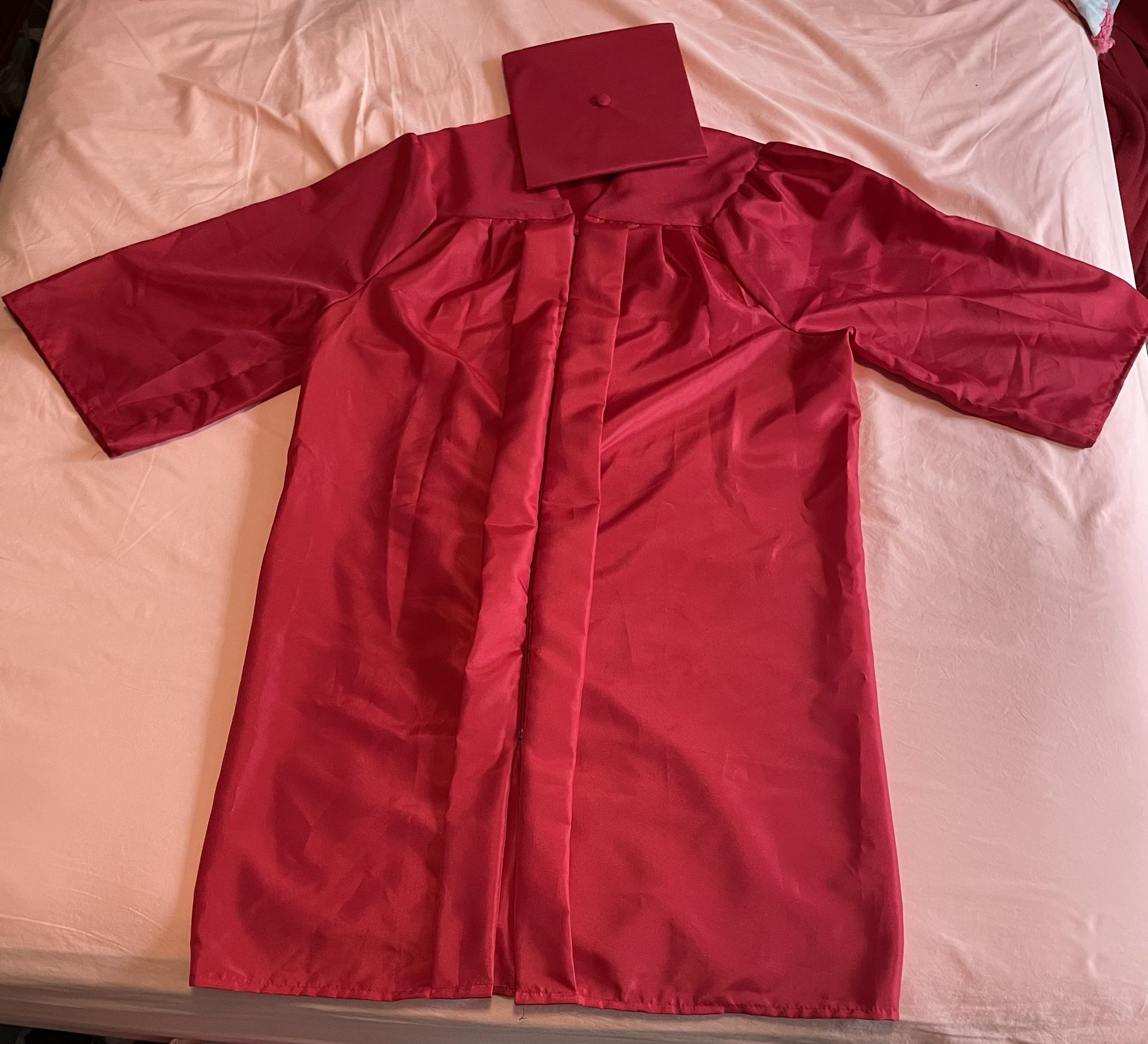 Red Graduation Cap and Gown