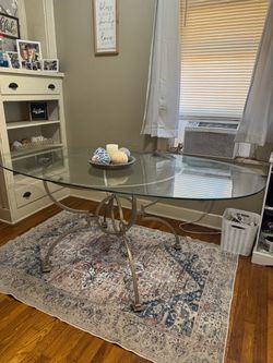 Beautiful Oval Dining Table 1” Beveled Glass. 6 ft wide x 38” Deep x 30” Tall.