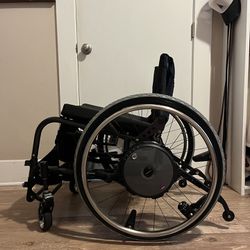 E-Motion M25 power assist wheels Quickie Wheelchair