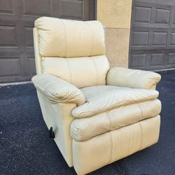 GENUINE LEATHER ROCKER RECLINER WITH SWIVEL BASE.