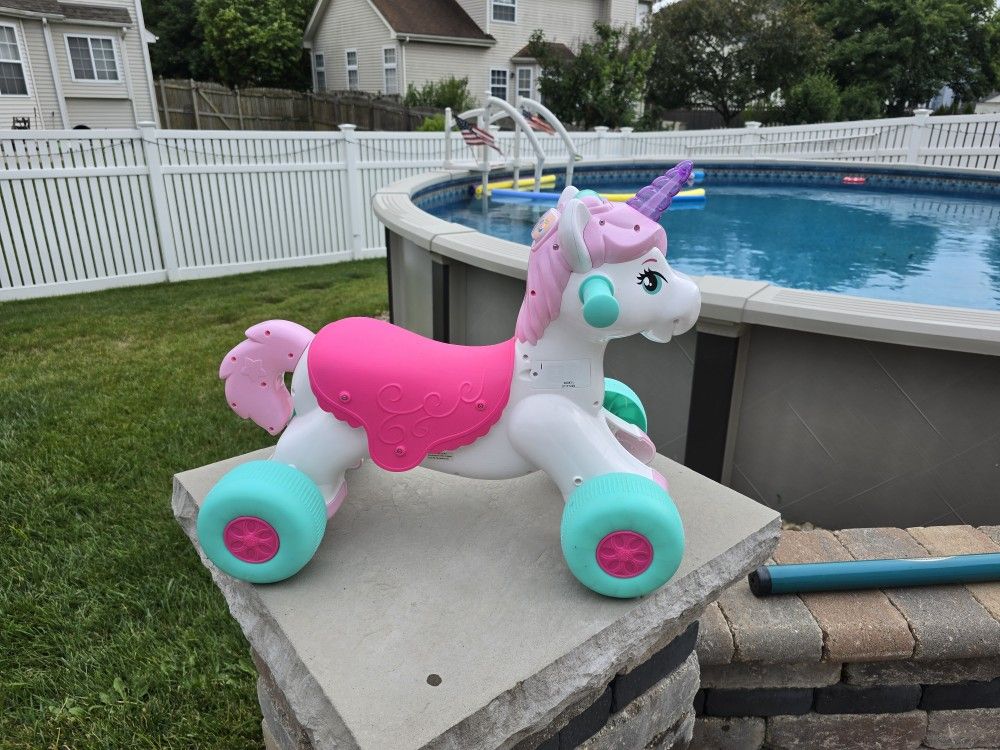Girl Riding Unicorn
