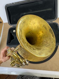 Used Bach Trumpet TR300 with case, visible wear from long use, comes with mouthpiece