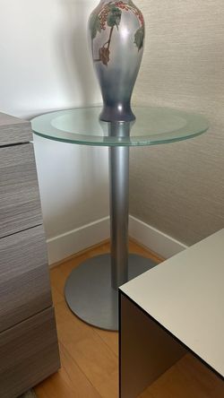 Steel table with beveled glass