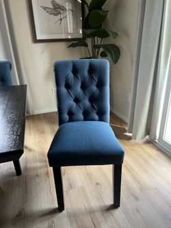 4 dining chairs and a bench