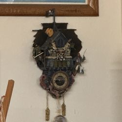 Disney Pirates of the Caribbean Illuminated Black Pearl Cuckoo Clock, a collectible manufactured by The Bradford Exchange