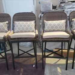  4 stationary chairs
Comes with CushionGuard Toffee Trellis Tan Cushions
Made with a durable, rust-resistant steel frameIncludes high-dining slat tabl