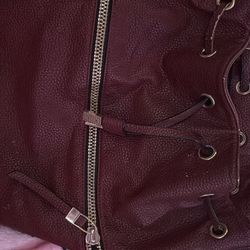 Burgundy colored purse