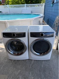 Electrolux washer and electric dryer 4. 5 cubic feet almost new working perfect clean one receipt for 6 months warranty