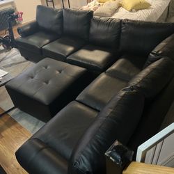 Black Couch- With Ottoman, Excellent Condition, Barely Used. Also Comes Apart Into Two Sectionals.