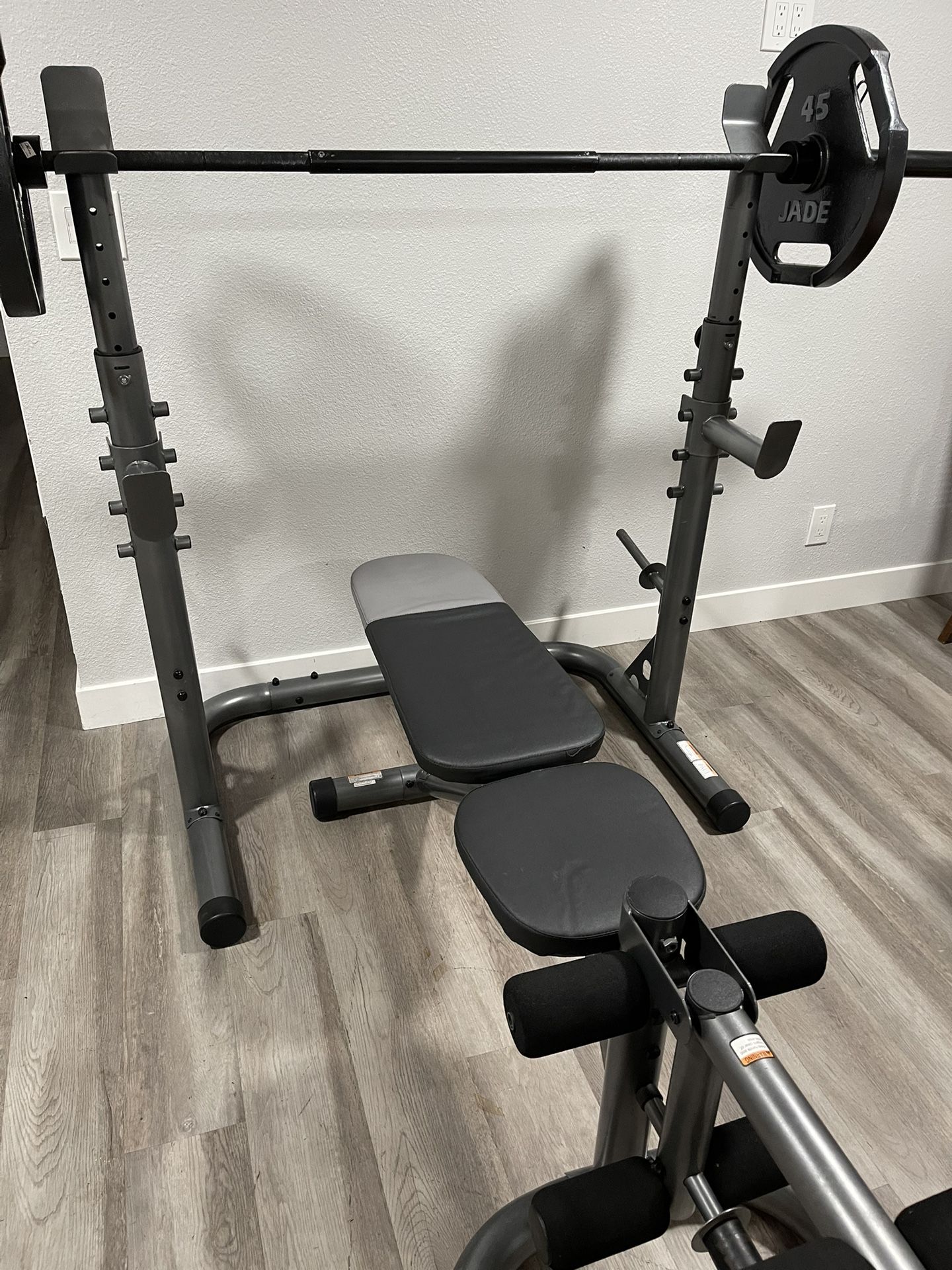Bench press with weights and Olympic bar