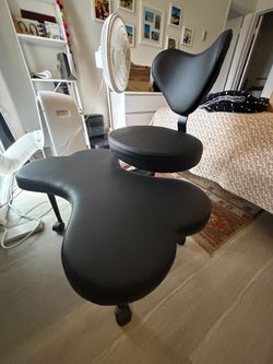 Black Cross-Legged Swivel Chair
