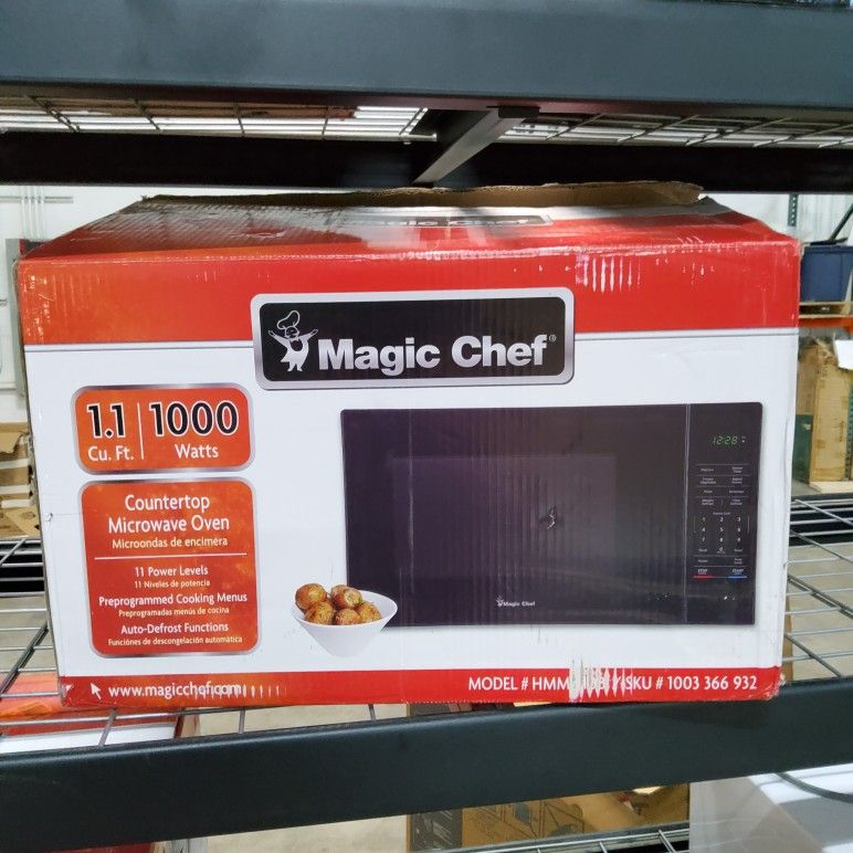 0.7 cu ft countertop microwave in black with gray cavity