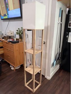 Floor lamp with shelves