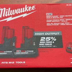 Brand New In The Box M12 Batteries And Charger.  
