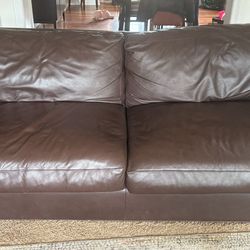 Crate and barrel brown leather pull out couch