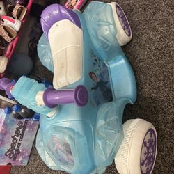 Kids Frozen Quad Power Wheel $50