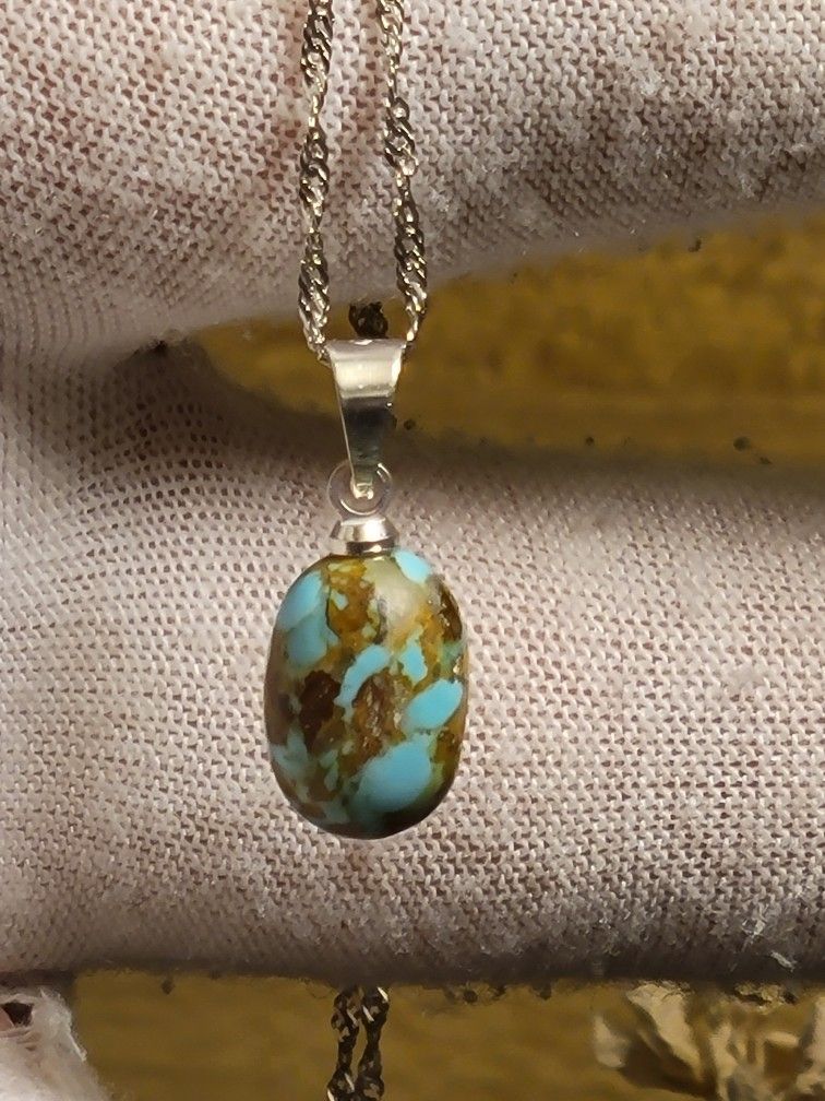 Kingman Turquoise Pendant Polished Nugget Stabilized Sterling Silver Bail