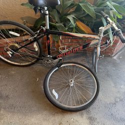 2 Complete Bikes Men And Women  One Is Giant Cypress And Other Specialized