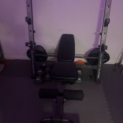 bench press with weights and floor mats