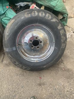 Two racing rims with tires slicks 
