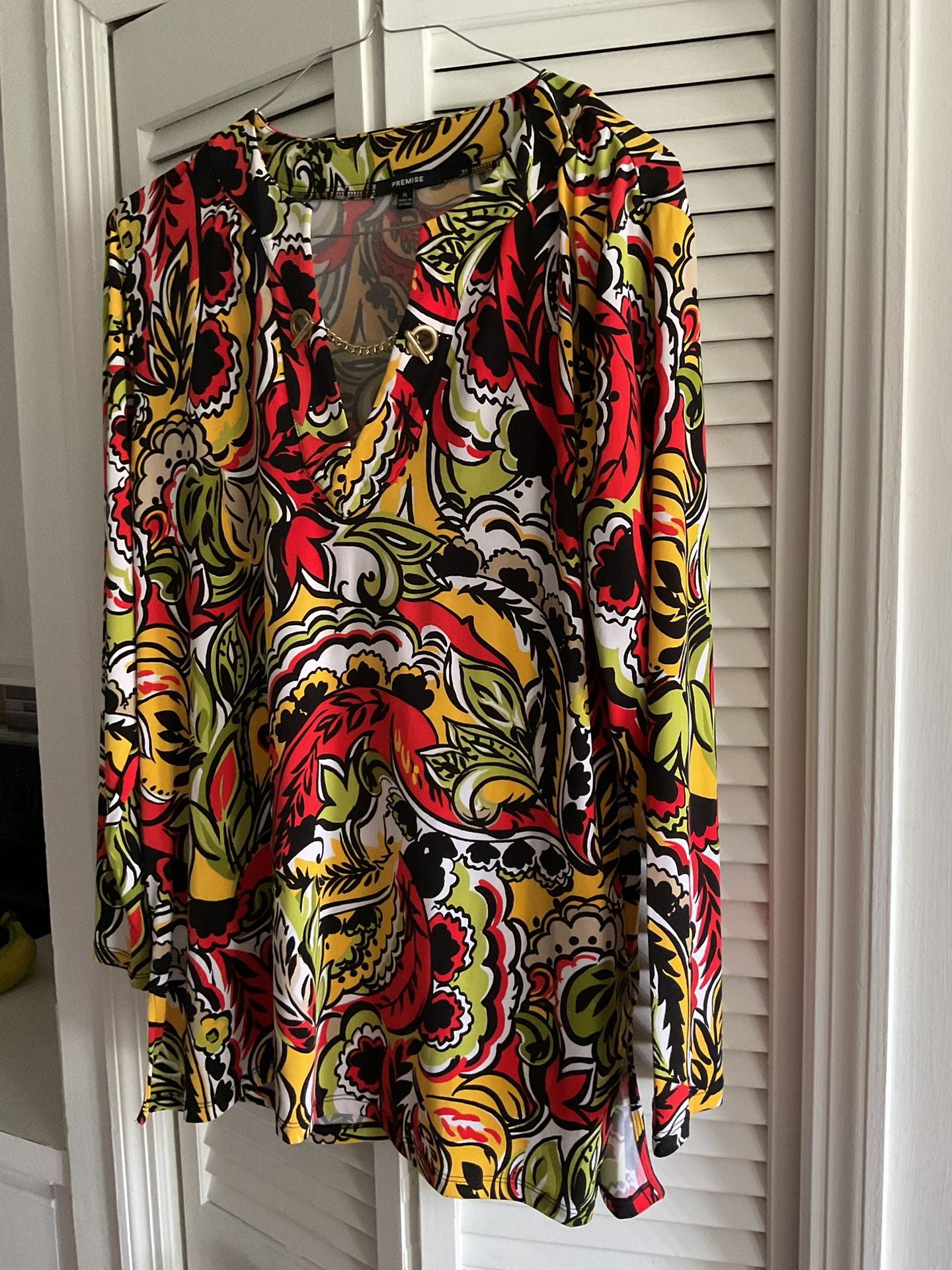 Multi-Colored Tunic Top With Chain Detail At The Neckline Size XL $25.00