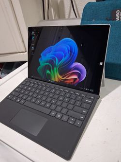 Microsoft  touchscreen  Surface pro 3.  Windows 10.  Intel core i5 - 4300U CPU processor.    Good working condition.   14 inches screen.  wifi. Webcam