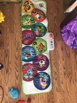 Leapfrog game sheet with light, music, songs $20 . Got as gift, 95% new condition