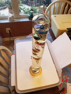 Indoor Vintage Galileo thermometer. Height 17 inch
