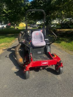 Toro titan commercial mower with bagger