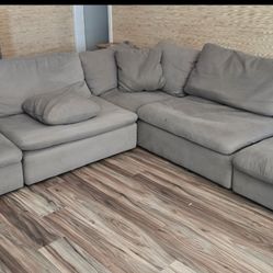 Grey down sectional couch