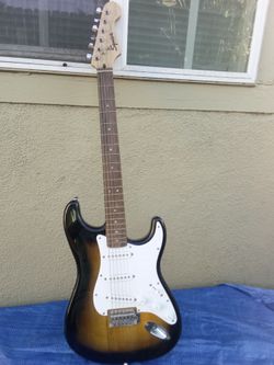 Fender squire stratocaster guitar sunburst