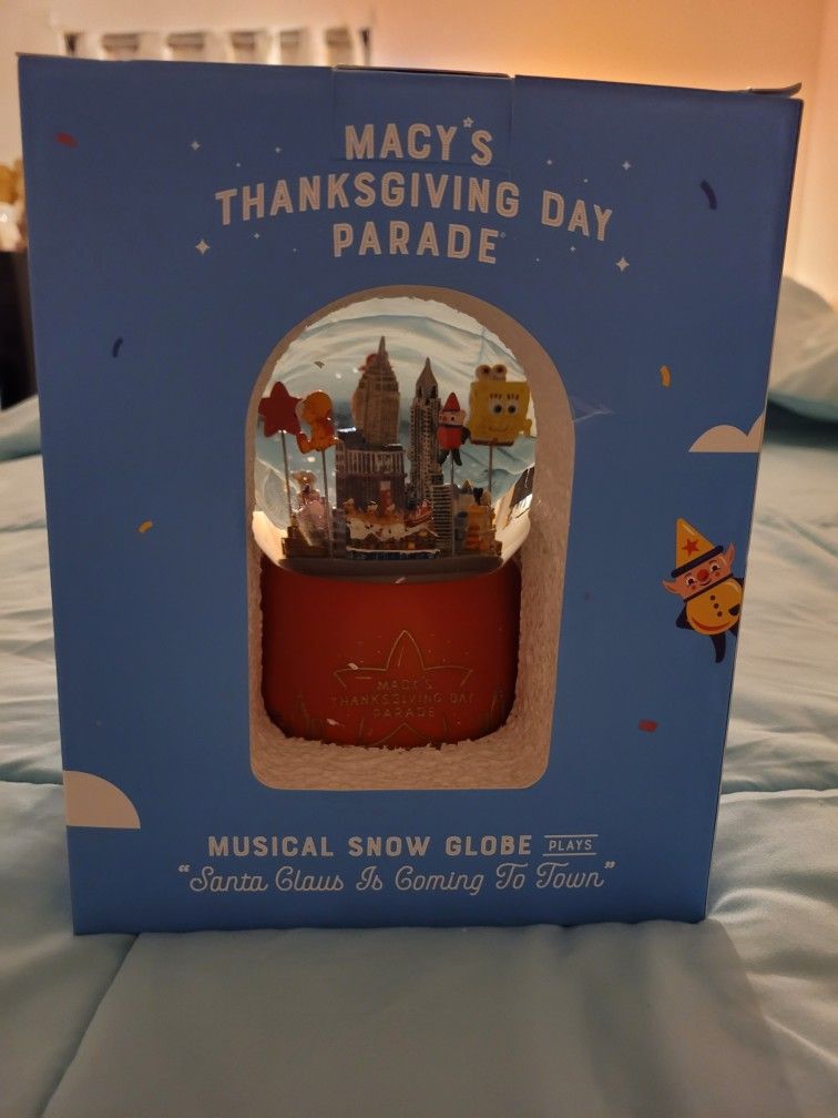 Macys Thanksgiving day parade musical snow globe