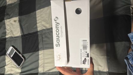 Kids black saucony