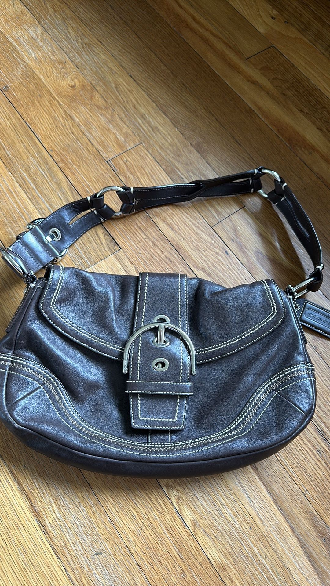 Brown leather coach bag