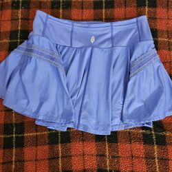 Free people blue tennis skirt with built in shorts. 