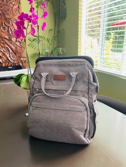Multifunctional Diaper Bag Backpack with Fold-Out Changing Station / Bassinet