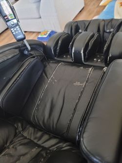 Zero gravity massage chair with heated seat.