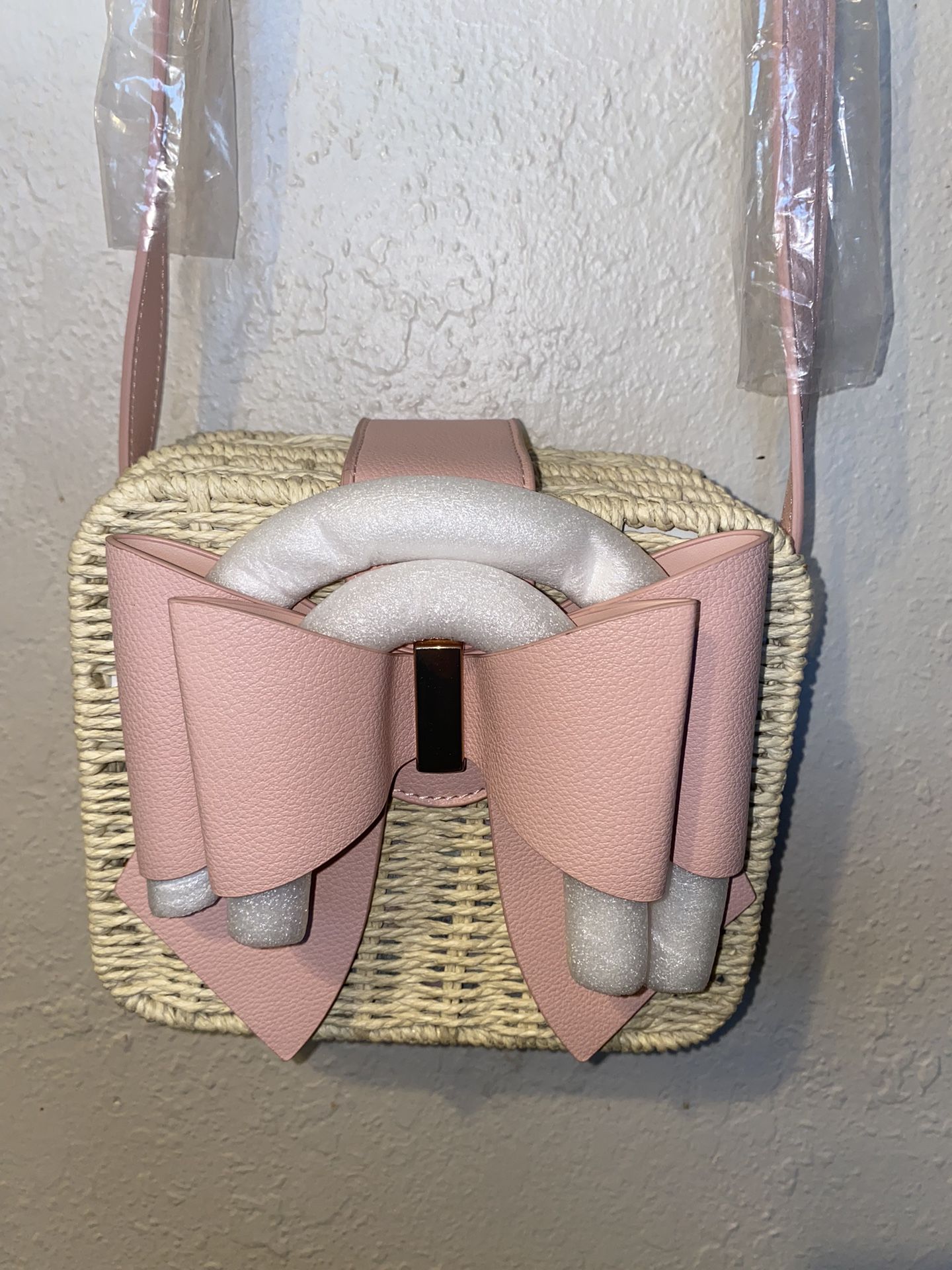 Tiny crossbody wicker Handbag with Pink vegan leather bow