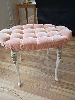 Coral color oval ottoman