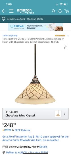 New Toltec stem pendant light In black copper finish with chocolate icing crystal glass shade. 16 inches