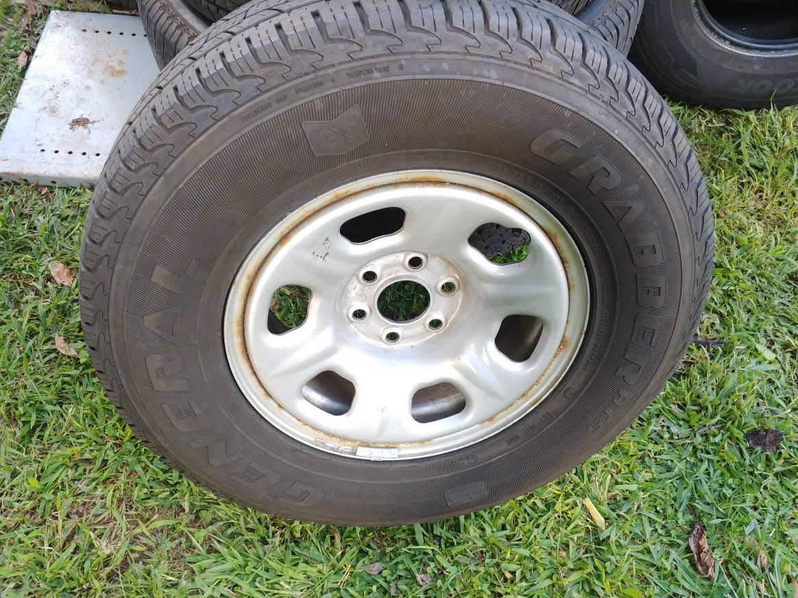 05 - 18 Nissan Frontier wheel with A General Grabber HTS tire 235/75/r15