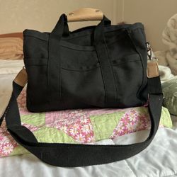 black canvas shoulder bag