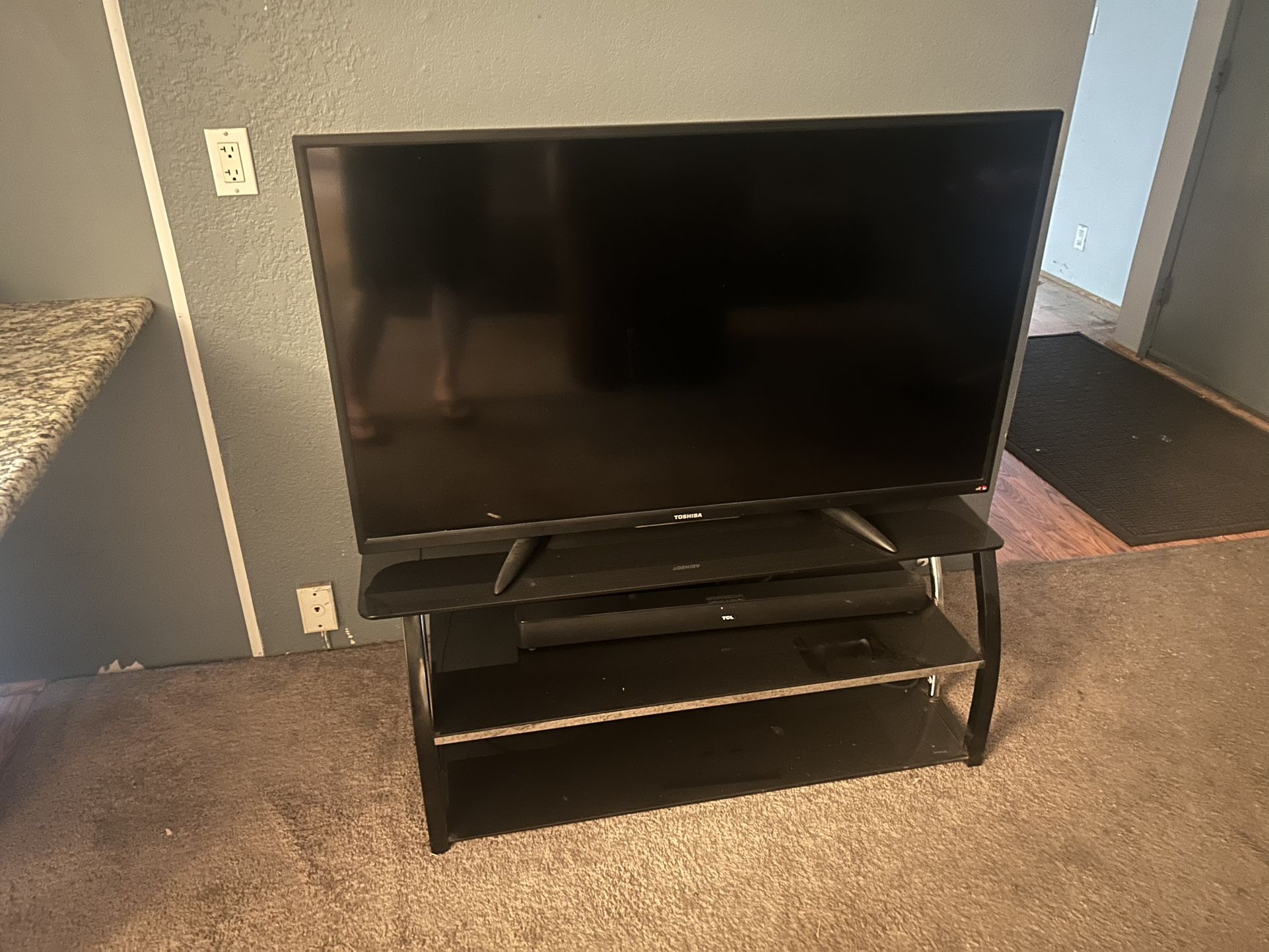 Toshiba Fire TV, TV Stand and Speaker