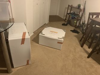 Washer and dryer storage bins