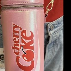 Pink Cherry Coke mini crossbody purse by SkinnyDip London. 