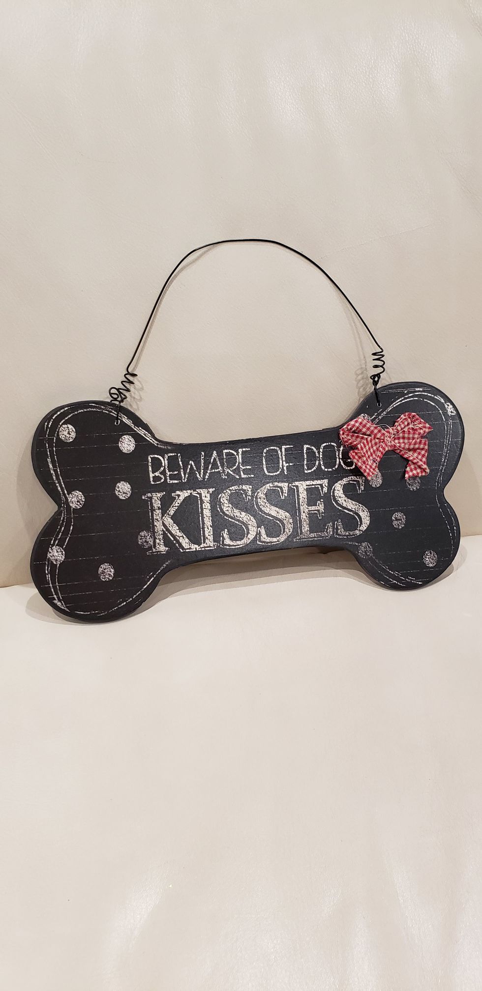 Beware of dog kisses funny decoration 11.75 x 5.6" brand new easy to hang on front door, garage and more. With white red fabric bow.