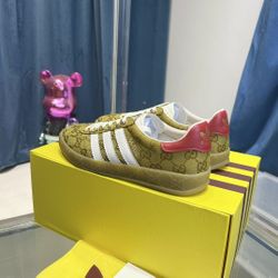 Women's adidas x Gucci co-branded Gazelle sneakers