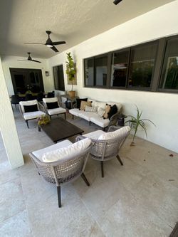 Sofa, 4 arm chairs and coffee table