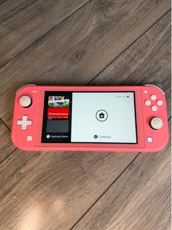 Nintendo Switch Lite Coral – Excellent Condition